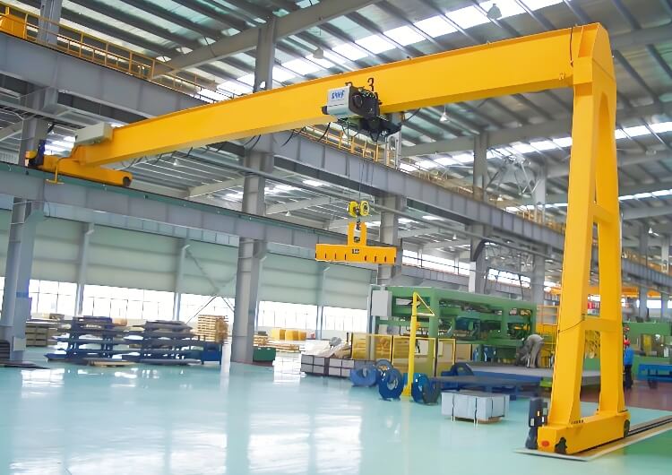 Yellow gantry crane operating in an industrial production yard